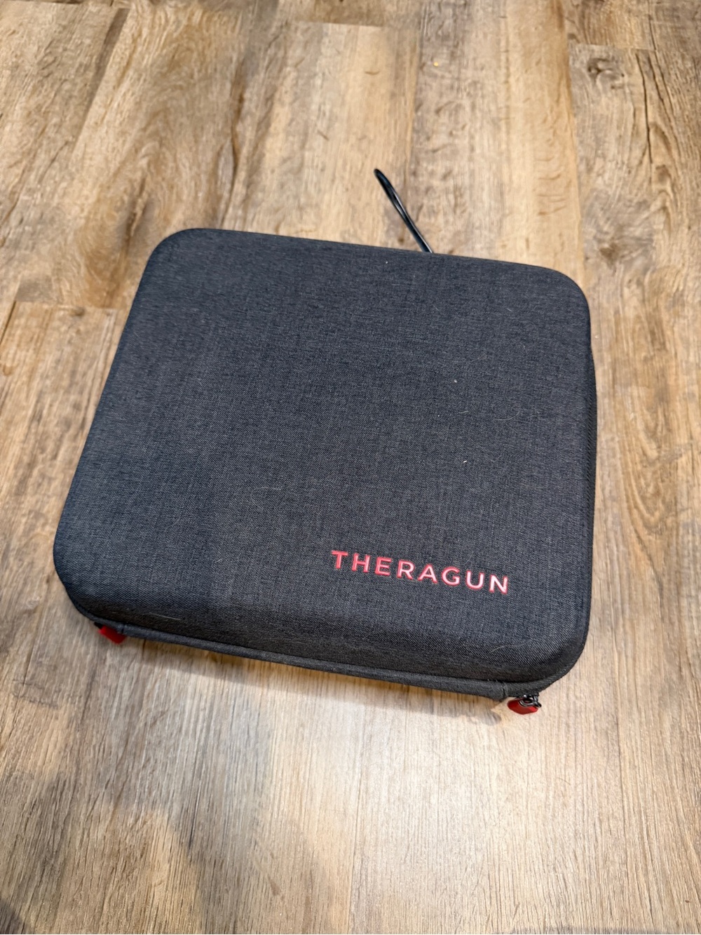 White Theragun Massage Gun with Travel Case - Picture 2 of 5